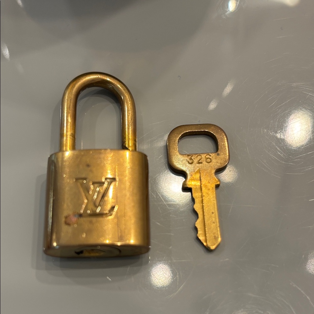 Authentic Louis Vuitton Gold Tone Padlock and Key Set #326